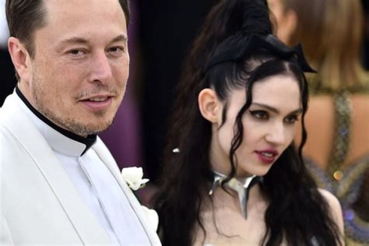 Grimes claims journalists are "stalking", attempting to "dox" her and