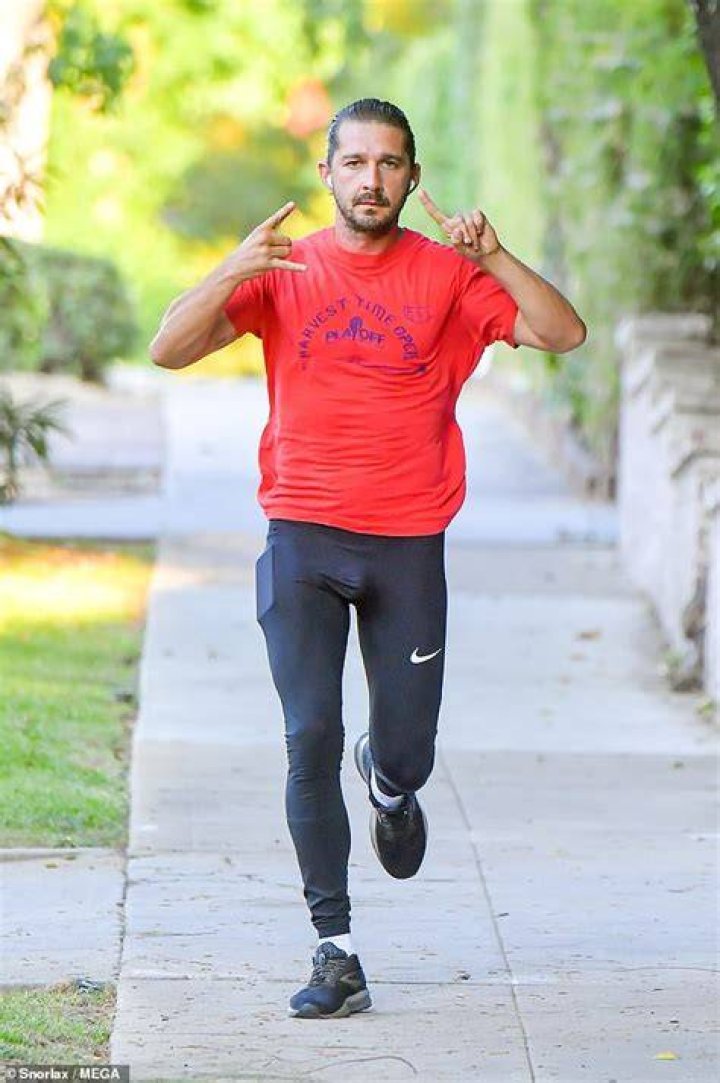 Shia LaBeouf works up a sweat on his daily run in red Tshirt Daily
